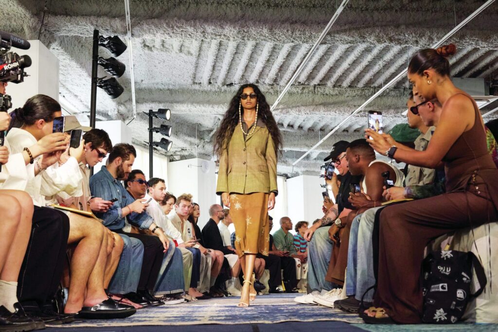A woman walks the runway during a fashion show